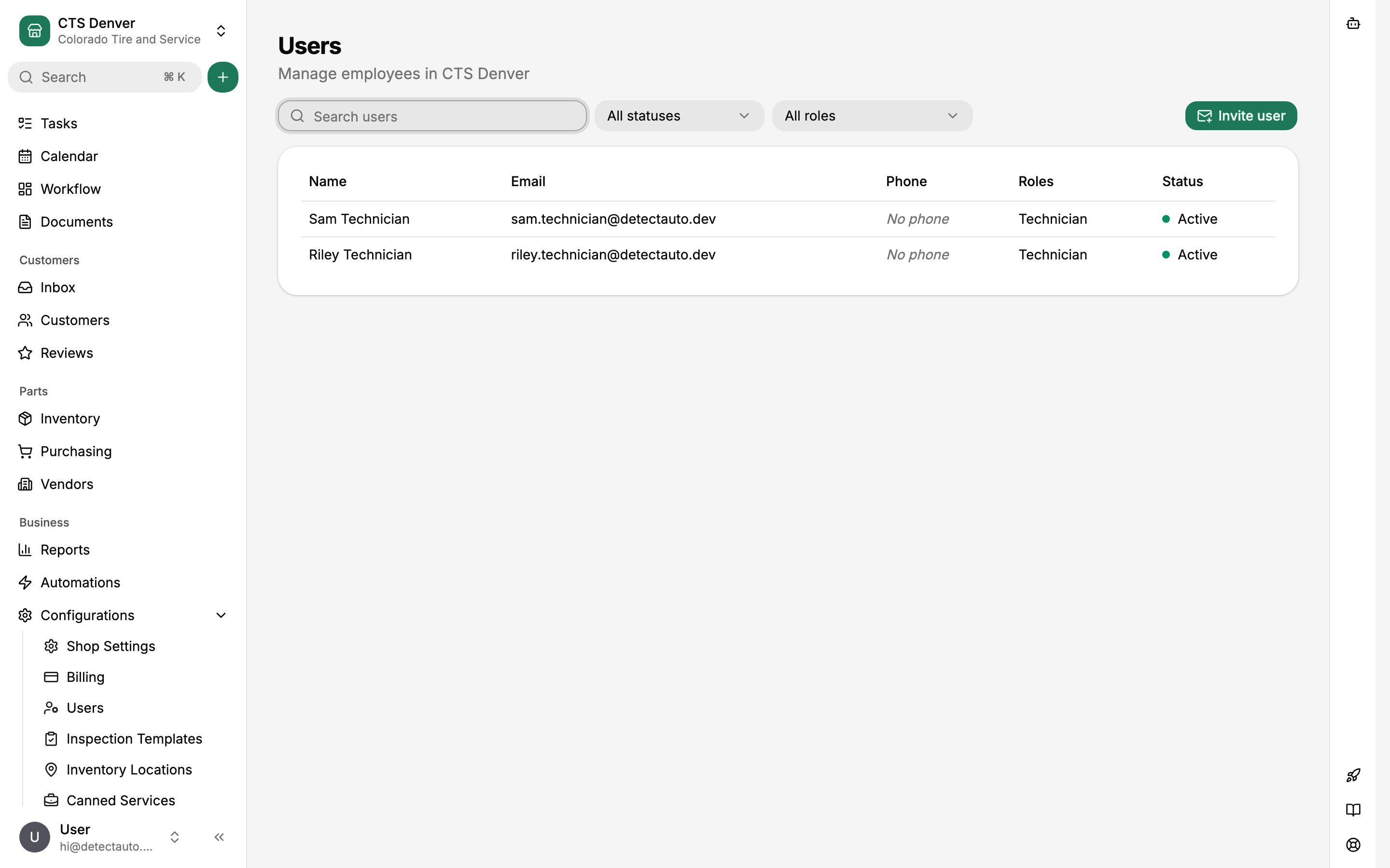 Users page with invite button, roles, and status